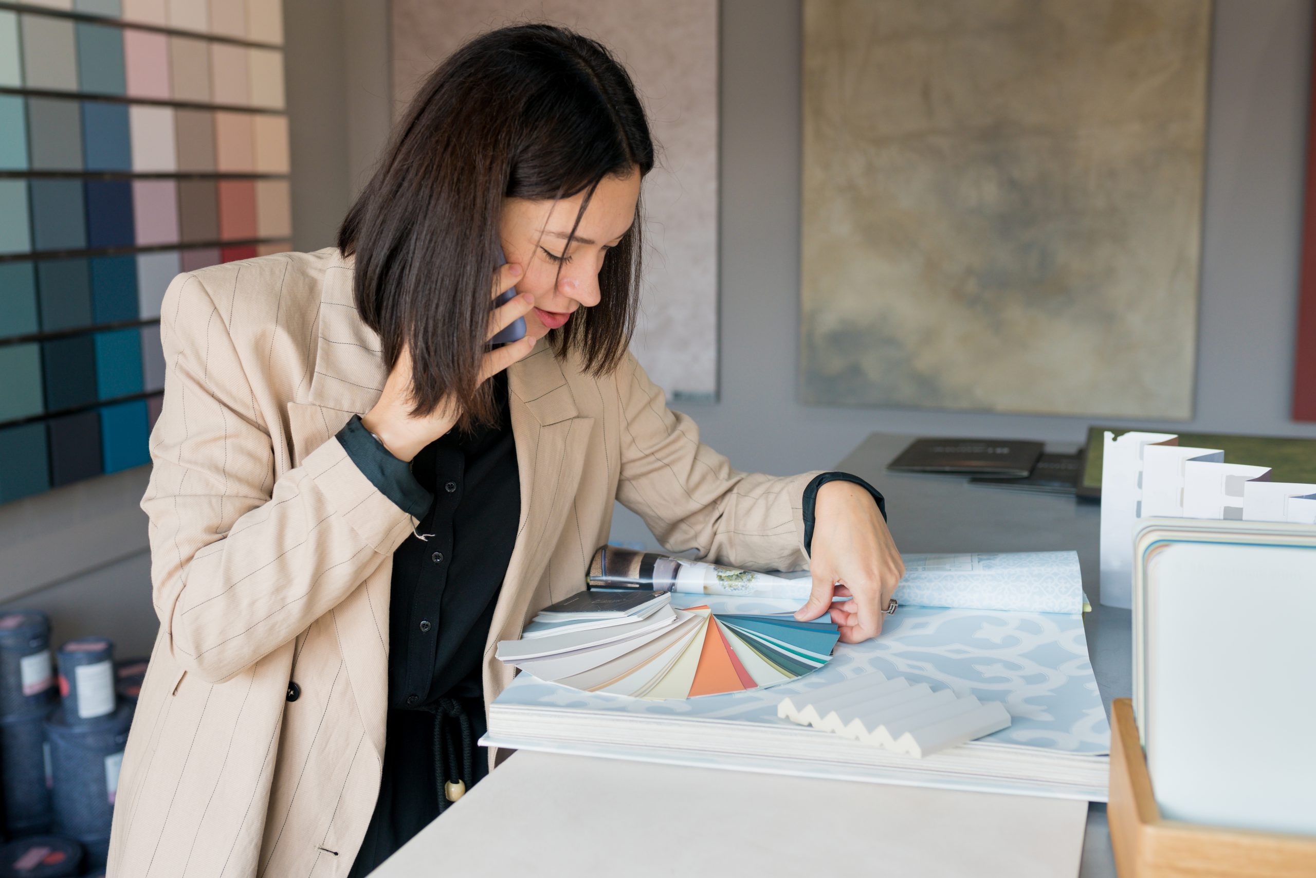 Woman Designer Choosing Wallpaper From Catalog For 2022 11 15 19 03 00 Utc
