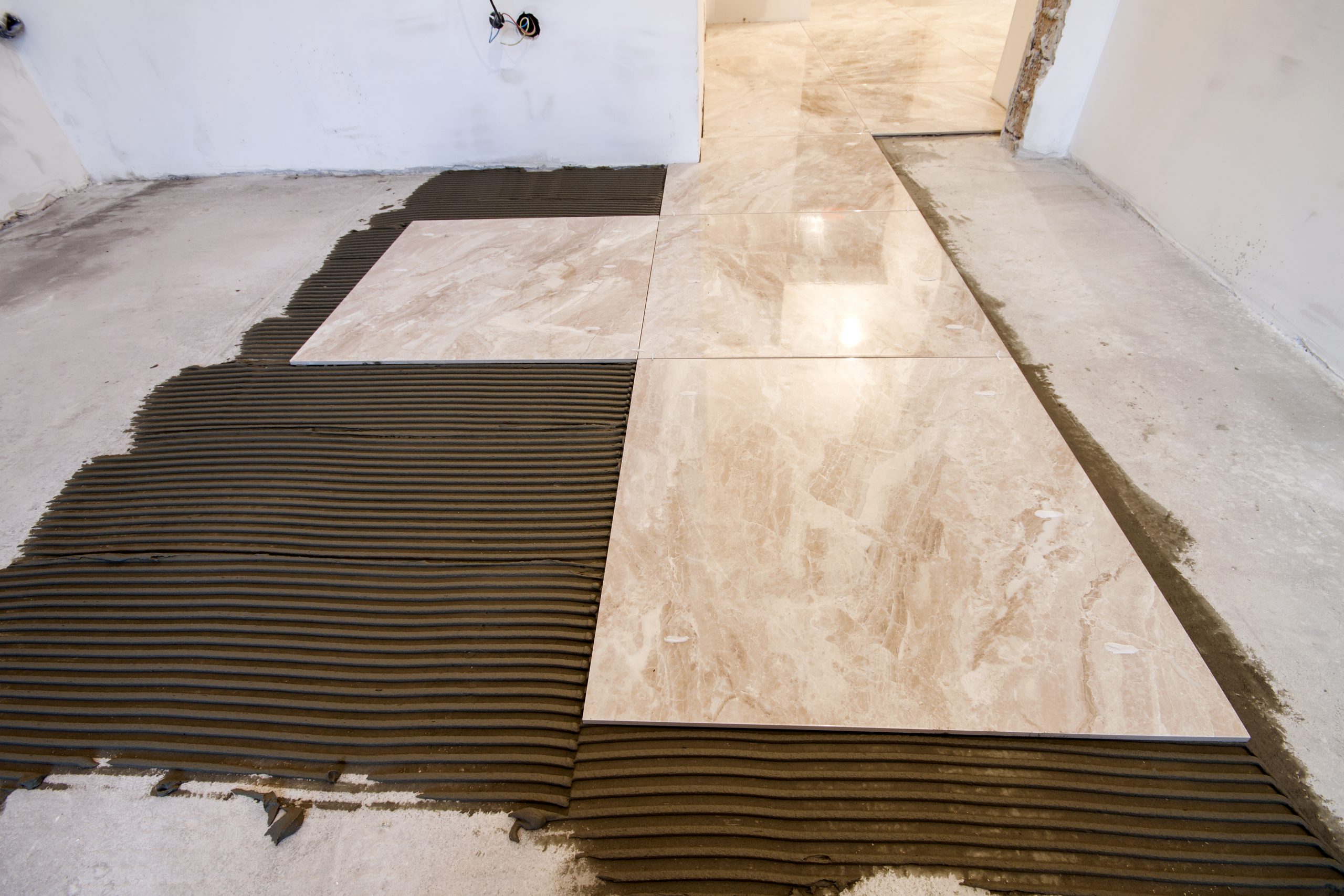 Ceramic Tiles. Floor Tiles Installation. Home Improvement, Renovation Ceramic Tile Floor Adhesive, Mortar