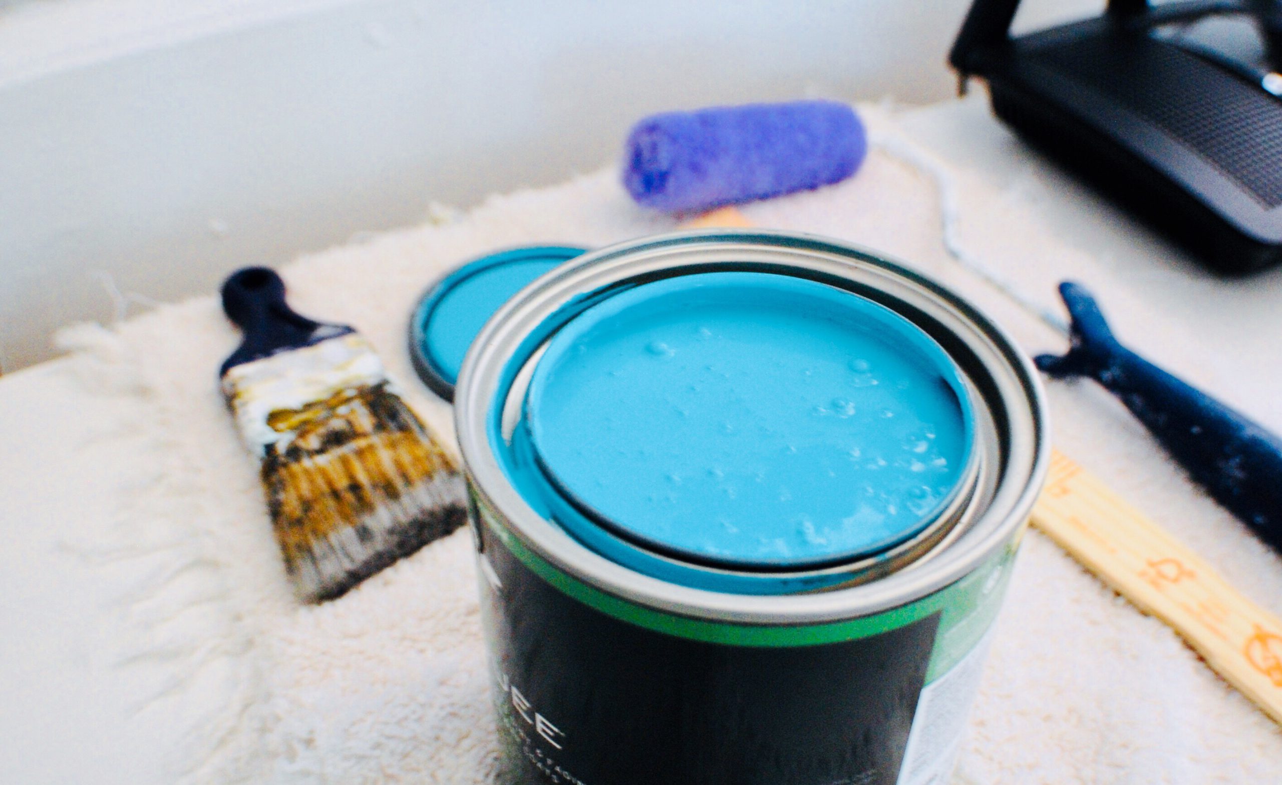 A Freshly Opened Can Of Turquoise Paint And Paintb 2023 11 27 05 26 53 Utc