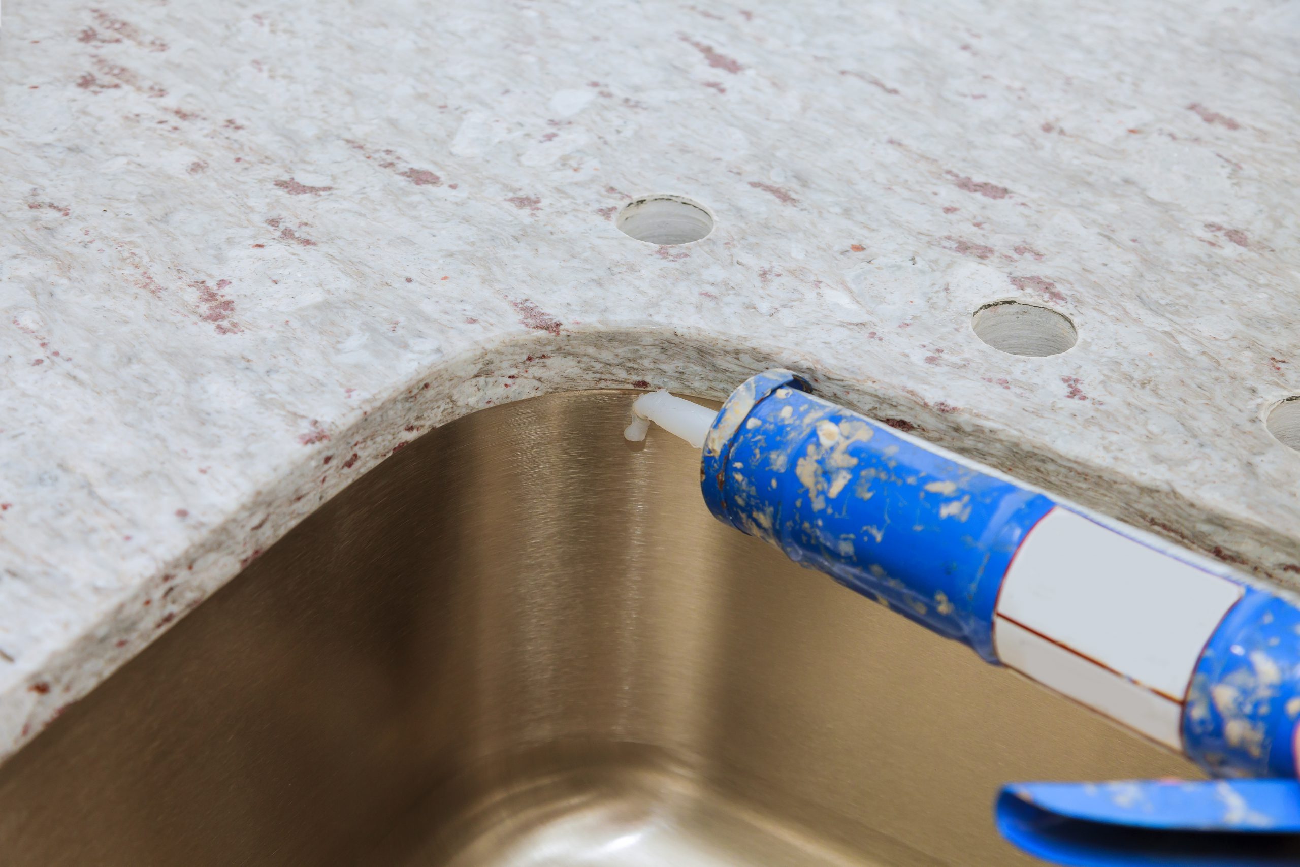 Gun Putting Silicone Sealant To Installing A Kitchen Sink