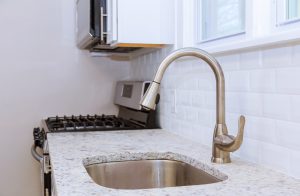 Close Up Of Modern Stylish Stainless Steel Kitchen Sink