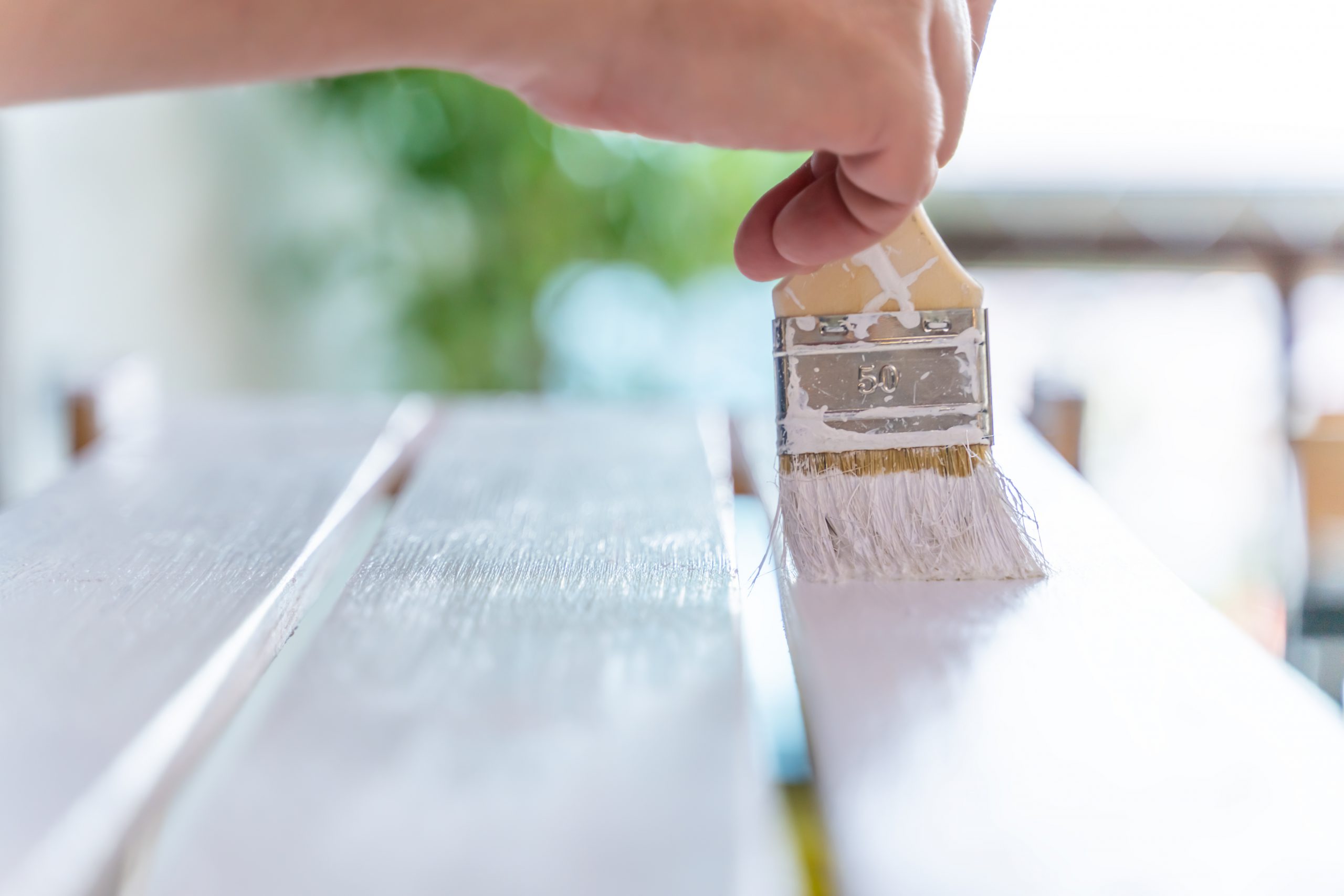 Man S Hand Paints Wooden Furniture With White Pain 2023 11 27 05 00 37 Utc