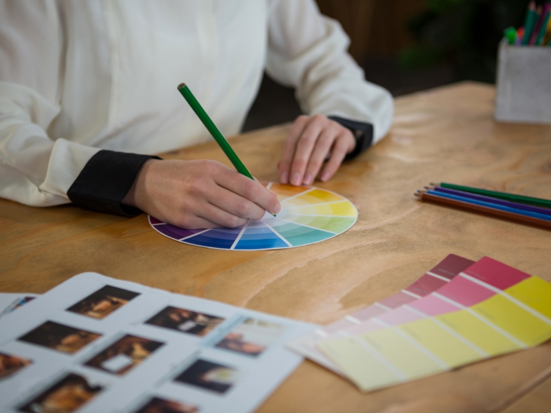 Female Graphic Designer Working At Desk